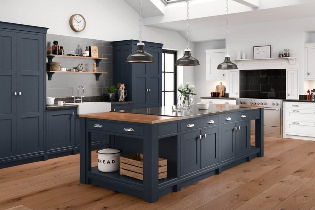 Blue kitchen cabinets with a central island and modern appliances in a stylish, contemporary home.